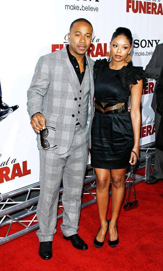 Columbus Short and Tanee McCall-Short at a movie premiere.